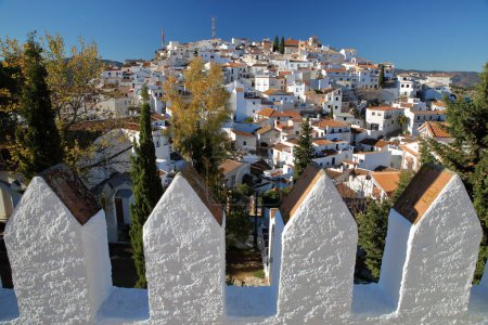 The village of Comares, Axarquia, Malaga province, Andalusia, Spain, viewed from the Arabic Castle. Comares is a village of Moorish origin with roofs and whitewashed houses