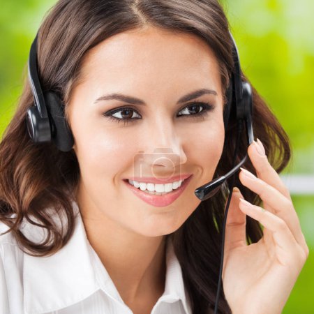 Photo for Portrait of happy smiling cheerful beautiful young support phone operator in headset, at office - Royalty Free Image