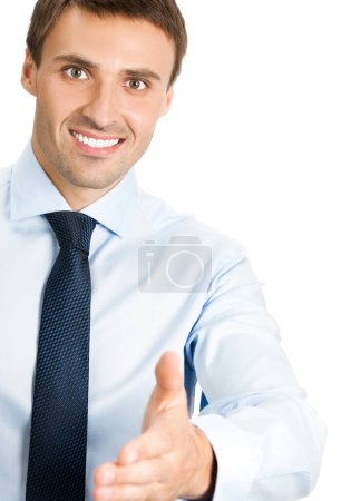 Foto de Feliz joven hombre de negocios sonriente dando la mano para el apretón de manos, aislado sobre fondo blanco - Imagen libre de derechos