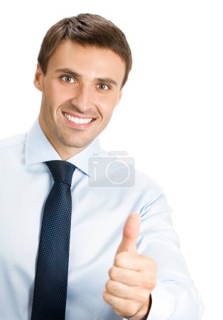 Foto de Feliz joven hombre de negocios sonriente con pulgares hacia arriba gesto, aislado sobre fondo blanco - Imagen libre de derechos