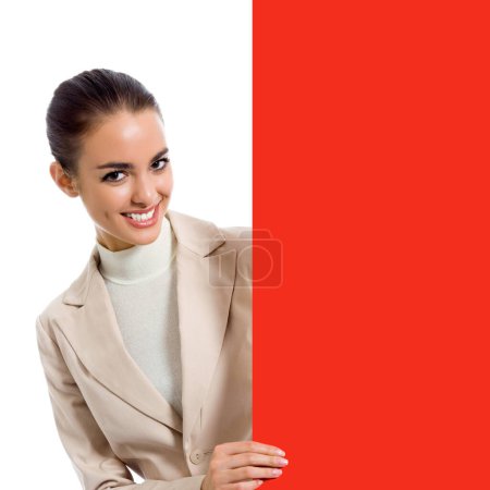 Photo for Happy young business woman showing blank red signboard, isolated over white background - Royalty Free Image