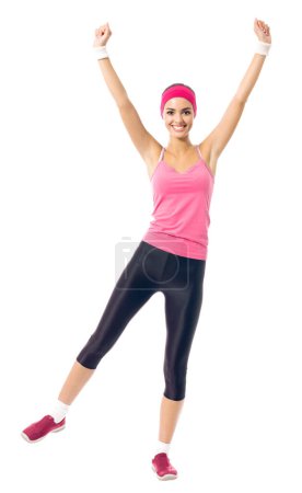 Foto de Joven mujer feliz en ropa deportiva roja haciendo ejercicio de fitness, aislado en blanco - Imagen libre de derechos