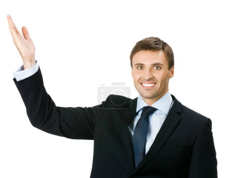 Photo for Happy smiling young business man showing blank area for sign or copyspase, isolated over white background - Royalty Free Image