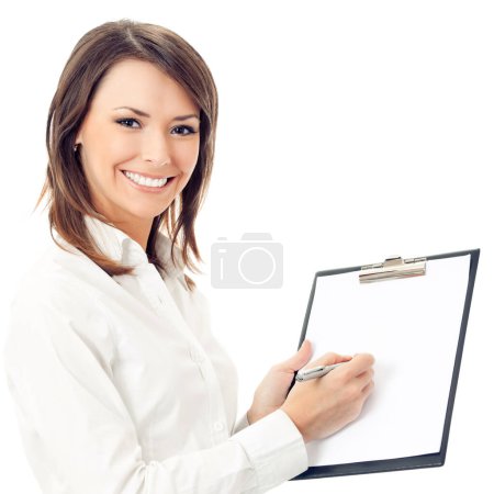 Photo for Happy smiling cheerful young businesswoman writing on clipboard, isolated on white background - Royalty Free Image
