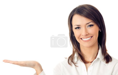 Photo for Happy smiling young businesswoman showing blank area for something, sign or copyspase, isolated over white background - Royalty Free Image