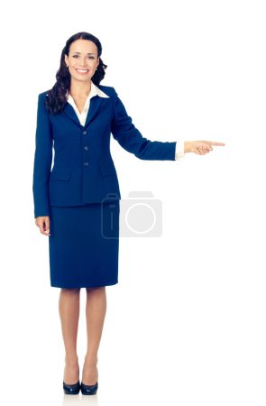 Photo for Full body of happy smiling young beautiful business woman in blue confident suit, showing on something or copyspace area for product or sign text, isolated over white background - Royalty Free Image