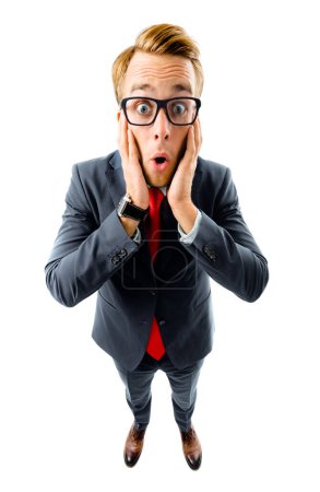 Photo for Wow! It's unbelievable! Full body portrait of shocked or very surprised funny young businessman with open mouth, in black confident suit and red tie, top angle view shot, isolated against white background. Business concept. - Royalty Free Image