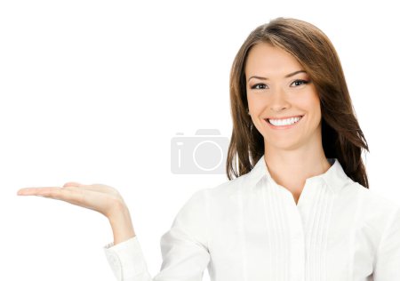 Photo for Happy smiling young beautiful business woman showing blank area for sign or copyspase, isolated over white background - Royalty Free Image
