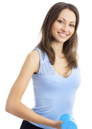 Foto de Mujer sonriente en ropa deportiva, haciendo ejercicio de fitness con mancuerna, aislada sobre fondo blanco - Imagen libre de derechos
