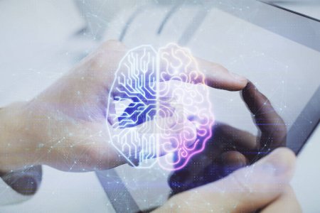 Photo for Double exposure of man's hand holding and using a digital device and brain hologram drawing. Data concept. - Royalty Free Image
