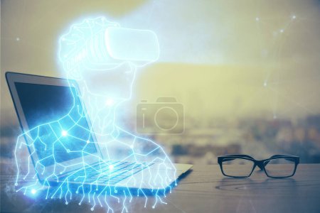 Photo for Computer on desktop with AR theme icon. Multi exposure. Concept of augmented reality. - Royalty Free Image