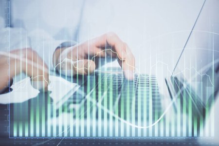 Photo for Double exposure of market chart with man working on computer on background. Concept of financial analysis. - Royalty Free Image
