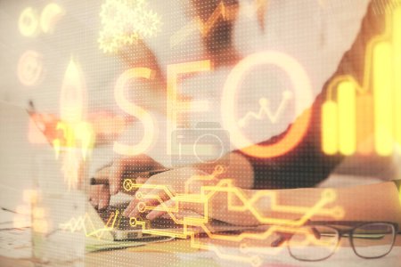 Photo for Double exposure of woman hands working on computer and seo hologram drawing. internet search concept. - Royalty Free Image