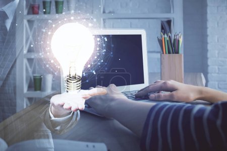 Photo for Double exposure of woman hands typing on computer and light bulb drawing. Idea concept. - Royalty Free Image