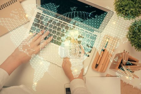 Photo for Double exposure of woman hands working on computer and financial theme hologram drawing. Top View. Business concept. - Royalty Free Image