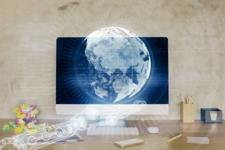 Foto de Doble exposición de escritorio con computadora y holograma del mapa del mundo. Concepto de red internacional de datos. - Imagen libre de derechos