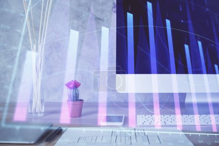 Foto de Holograma gráfico de Forex en la tabla con el fondo de la computadora. Exposición múltiple. Concepto de mercados financieros. - Imagen libre de derechos