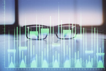 Photo for Financial graph hologram with glasses on the table background. Concept of business. Double exposure. - Royalty Free Image