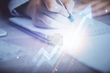Photo for Blue arrow over woman's hands taking notes background. Concept of success. Double exposure - Royalty Free Image