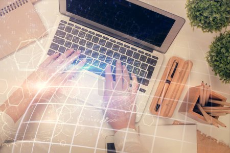 Photo for Double exposure of woman hands working on computer and world map hologram drawing. Top View. International business concept. - Royalty Free Image