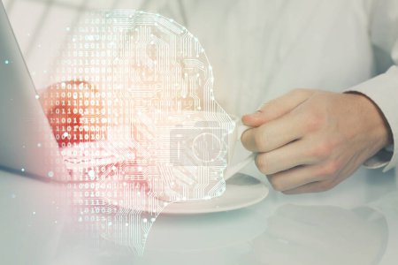 Photo for Man with computer background with brain theme hologram. Concept of brainstorm. Double exposure. - Royalty Free Image