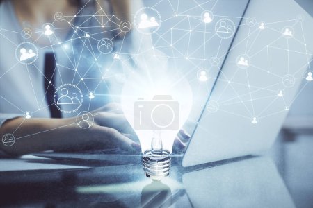 Photo for Double exposure of woman hands typing on computer and light bulb drawing. Idea concept. - Royalty Free Image