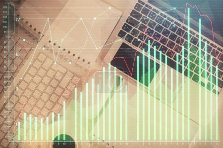 Photo for Financial market graph and top view computer on the desktop background. Multi exposure. Investment concept. - Royalty Free Image