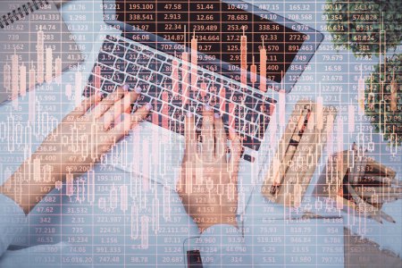 Photo for Double exposure of woman hands working on computer and forex chart hologram drawing. Top View. Financial analysis concept. - Royalty Free Image