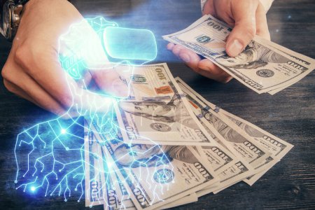 Foto de Multi exposición de gafas vr dibujo holograma y dólares de EE.UU. billetes y manos de hombre. - Imagen libre de derechos