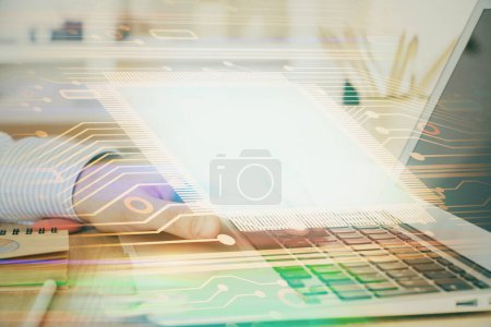 Photo for A man working on Laptop with technology theme drawing. Concept of big data. Double exposure. - Royalty Free Image
