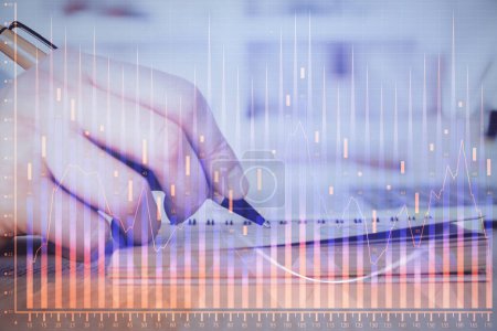 Photo for Double exposure of man doing notes of stock market with forex graph. Concept of research and trading. - Royalty Free Image