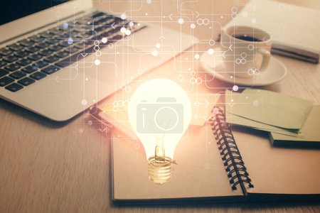 Photo for Double exposure of bulb drawing and desktop with coffee and items on table background. Concept of ideas. - Royalty Free Image