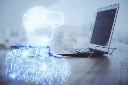 Photo for Computer on desktop with AR theme icon. Multi exposure. Concept of augmented reality. - Royalty Free Image