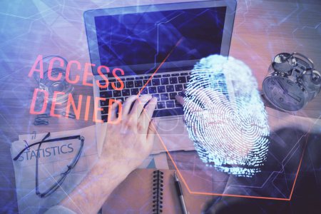 Photo for Double exposure of man's hands typing over computer keyboard and finger print hologram drawing. Top view. Personal security concept. - Royalty Free Image