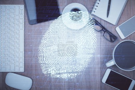 Photo for Double exposure of finger print over table with phone. Top view. Concept of mobile security. - Royalty Free Image