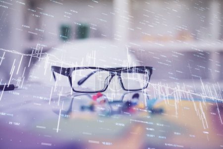Photo for Financial graph hologram with glasses on the table background. Concept of business. Double exposure. - Royalty Free Image