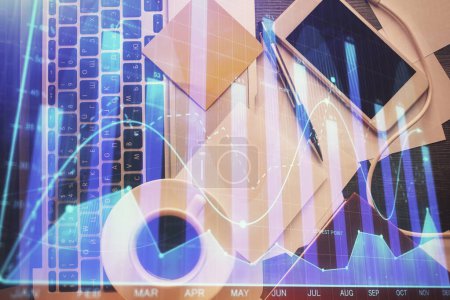 Photo for Double exposure of financial chart drawing over table background with computer. Concept of research and analysis. Top view. - Royalty Free Image