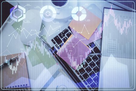Photo for Multi exposure of financial chart drawing over table background with computer. Concept of research and analysis. Top view. - Royalty Free Image
