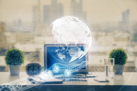Photo for Double exposure of desktop with computer and world map hologram. International data network concept. - Royalty Free Image
