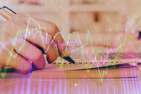 Photo for Double exposure of man doing notes of stock market with forex graph. Concept of research and trading. - Royalty Free Image
