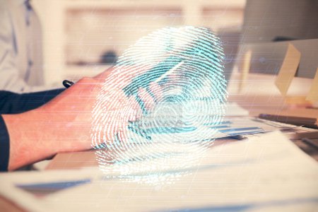 Foto de Doble exposición de las manos del hombre sosteniendo y usando un dispositivo digital y un dibujo holográfico de huellas dactilares. Concepto de seguridad. - Imagen libre de derechos