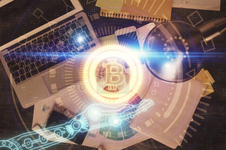Photo for Blockchain theme hologram drawings over computer on the desktop background. Top view. Double exposure. - Royalty Free Image