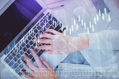 Photo for Double exposure of woman hands working on computer and forex chart hologram drawing. Top View. Financial analysis concept. - Royalty Free Image