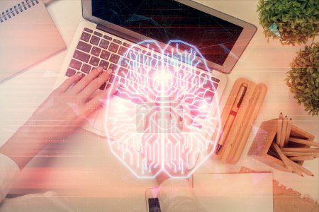 Photo for Double exposure of woman working on computer andhuman brain hologram drawing. Top View. Ai concept. - Royalty Free Image