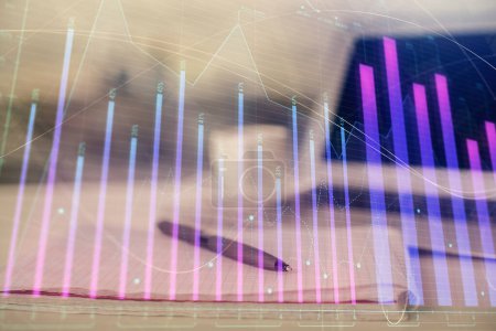 Photo for Double exposure of financial graph drawings and desk with open notebook background. Concept of forex market - Royalty Free Image
