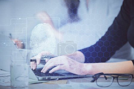 Photo for Double exposure of woman hands typing on computer and fingerprint drawing. Security concept. - Royalty Free Image
