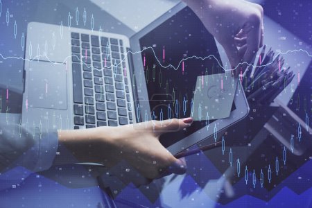 Photo for Double exposure of businesswoman hands typing on computer and financial graph hologram drawing. Stock market analysis concept. - Royalty Free Image