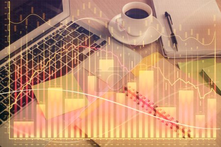 Photo for Multi exposure of forex graph drawing and desktop with coffee and items on table background. Concept of financial market trading - Royalty Free Image