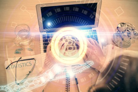 Photo for Double exposure of man's hands typing over computer keyboard and crypto currency theme hologram drawing. Top view. Blockchain concept. - Royalty Free Image