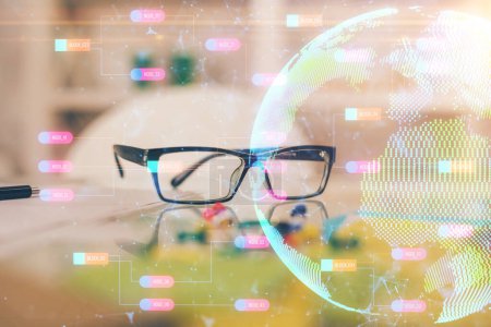Photo for Map hologram with glasses on the table background. Concept of globalization. Double exposure. - Royalty Free Image